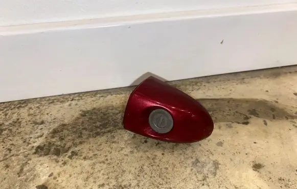 Jeep Cherokee Front door lock (next to the handle) 68225799AA
