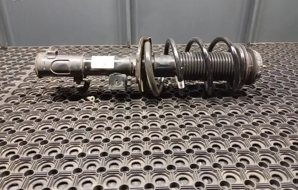 Front shock absorber with coil spring