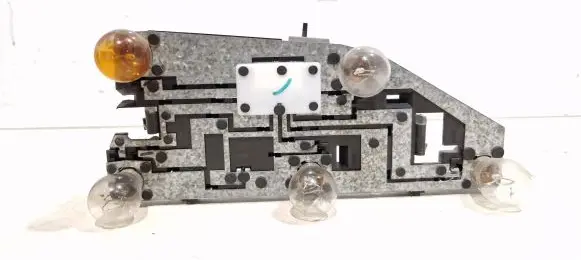 Tail light bulb cover holder