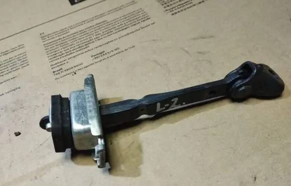 Honda FR-V Rear door check strap stopper