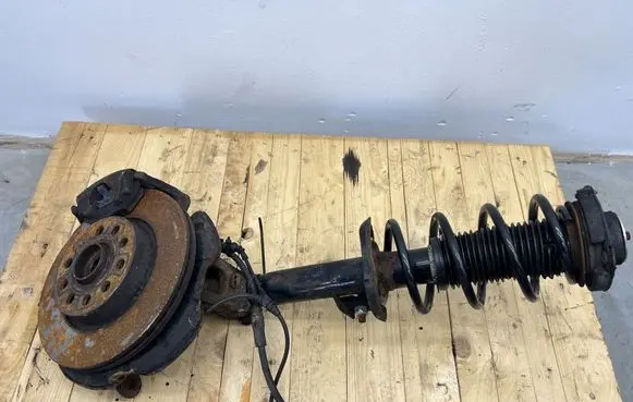 Front shock absorber with coil spring