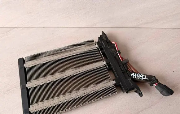 Volkswagen PASSAT B7 Electric cabin heater radiator 1K0963235F