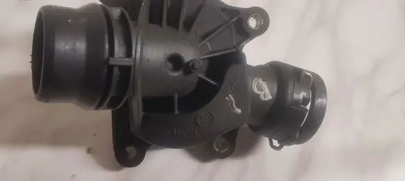 Thermostat/thermostat housing