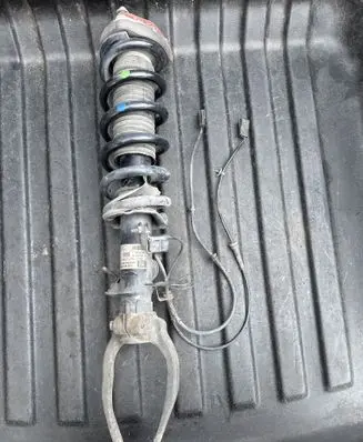 Infiniti FX Front shock absorber/damper 561101CF0F 442400005500 988051CF0A