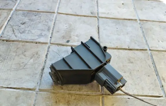 Fuel tank cap lock motor