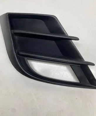 Mazda 3 II Front fog light trim/grill BCD250C11
