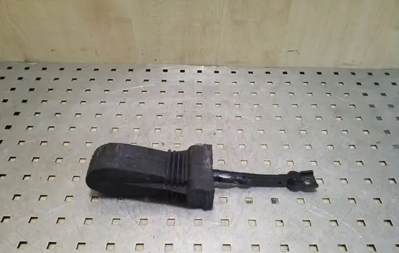 Front door check strap stopper