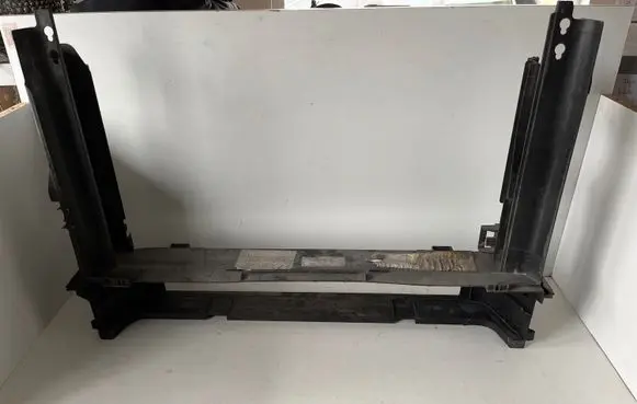Radiator support slam panel bracket