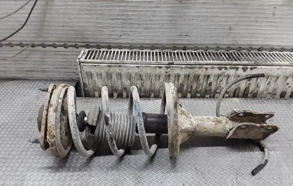 Mitsubishi Lancer Front shock absorber with coil spring