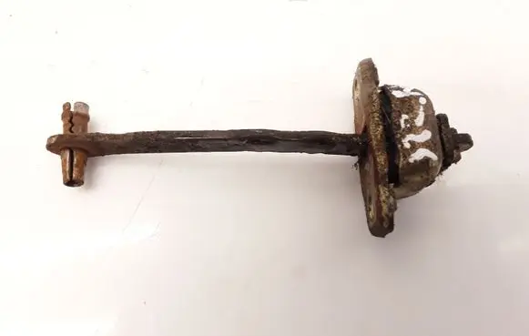 Front door check strap stopper