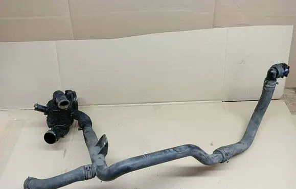 Skoda Octavia Mk2 (1Z) Engine coolant pipe/hose 03L121065T