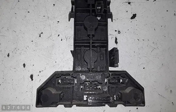 Tail light bulb cover holder