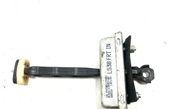Front door check strap stopper