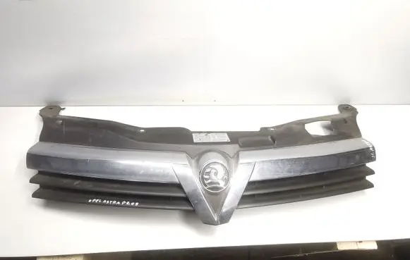 Opel Astra H Front bumper upper radiator grill 13108471