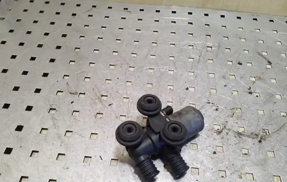 Coolant heater control valve