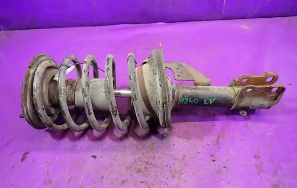 Chrysler LeBaron Front shock absorber with coil spring 