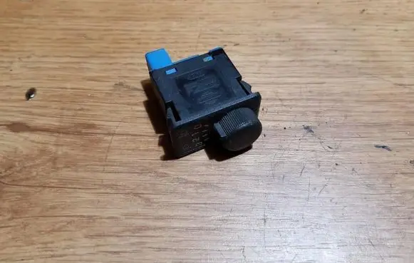 Headlight level height control switch