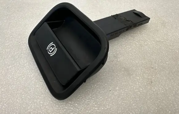 Porsche Cayenne (9PA) Hand brake release handle 7L5711814A