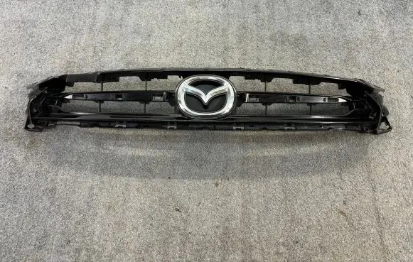 Mazda 2 Front bumper upper radiator grill D09J-50712 G027
