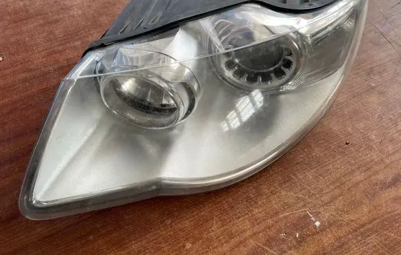 Volkswagen Touareg I Headlight/headlamp 7L6941031