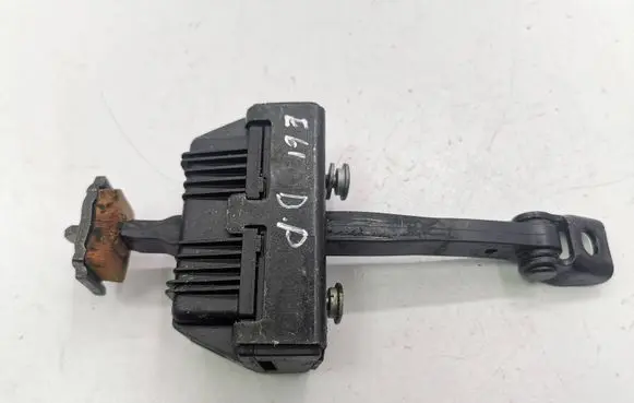 Front door check strap stopper
