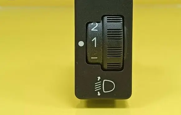 Headlight level height control switch