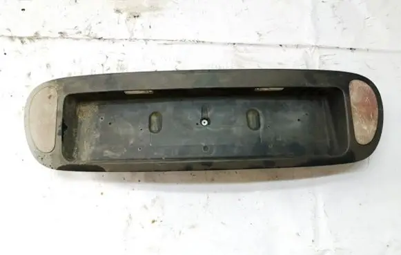 Renault Laguna I Trunk door license plate light bar 7711170346