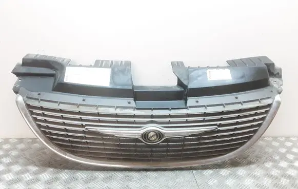 Chrysler Voyager Front bumper upper radiator grill 4857522AA