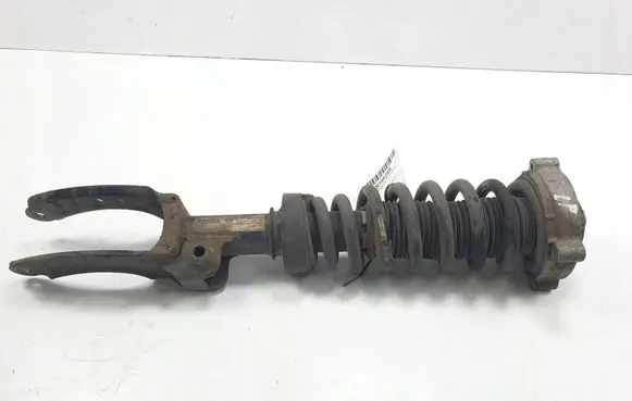 Volkswagen Touareg I Front shock absorber/damper 7L6413031N