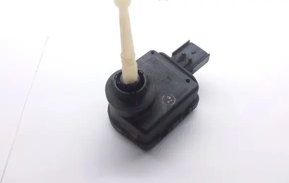 Chrysler Voyager Headlight level adjustment motor 0307852 4676678