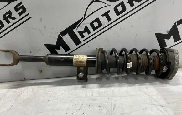 Front shock absorber with coil spring