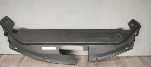Engine bonnet/hood lock trim molding