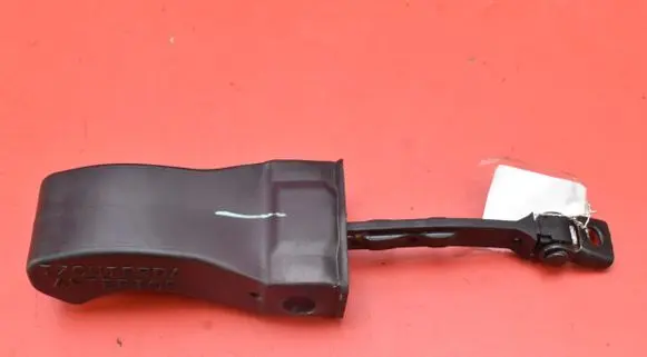 Front door check strap stopper