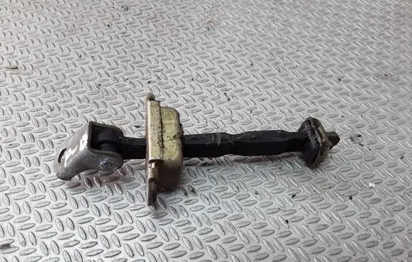 Front door check strap stopper