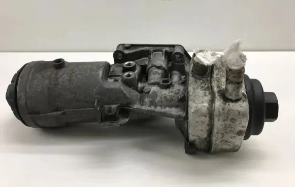 Audi A3 S3 8P Oil filter mounting bracket 045115389J