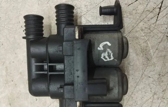 Coolant heater control valve