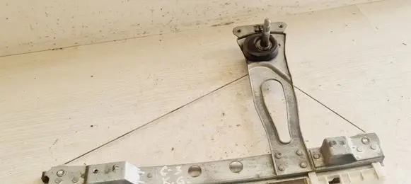 Rear door manual window regulator