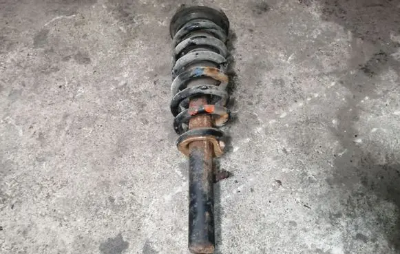 KIA Sorento Front shock absorber with coil spring