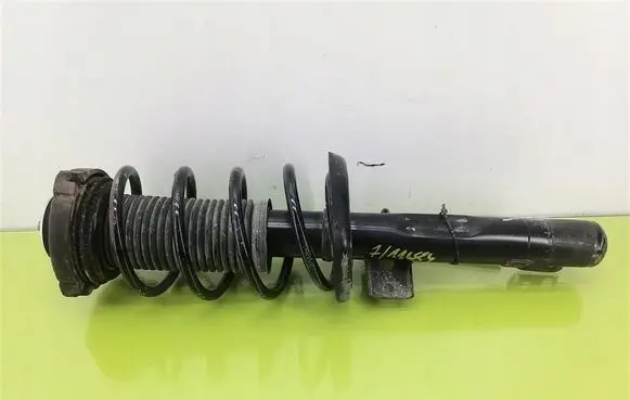 Front shock absorber with coil spring