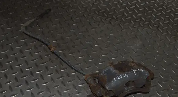 Volkswagen Golf VII Front brake caliper