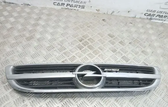 Opel Zafira A Front bumper upper radiator grill 24453538