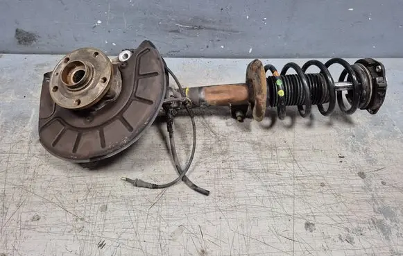 Volkswagen PASSAT B7 Front wheel hub spindle knuckle 