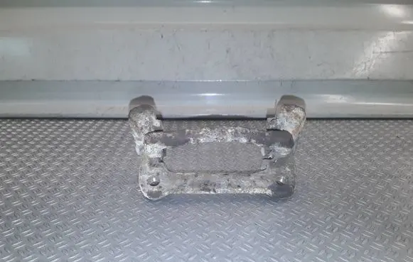 Toyota Corolla E120 E130 Brake caliper pad carrier rear 