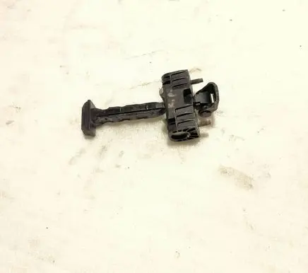 Front door check strap stopper