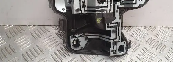 Tail light bulb cover holder