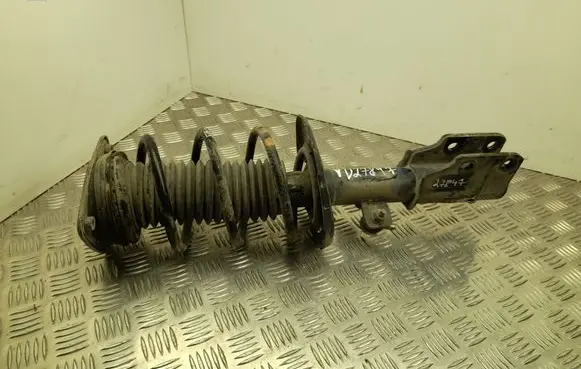 Front shock absorber with coil spring