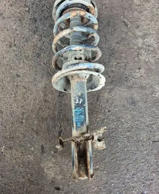Front shock absorber with coil spring