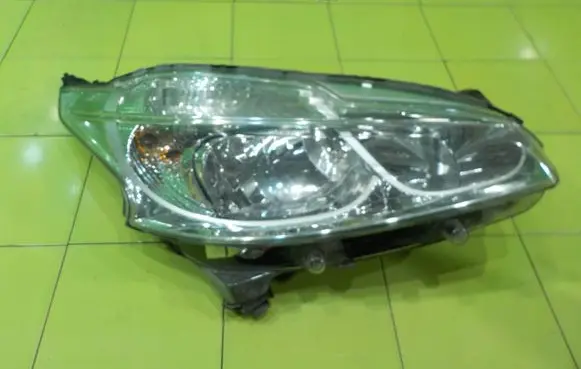 Peugeot 208 I Headlight/headlamp 9802221380