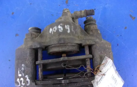 Mazda 323 Front brake caliper