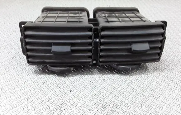 KIA Magentis Dash center air vent grill 974103C010